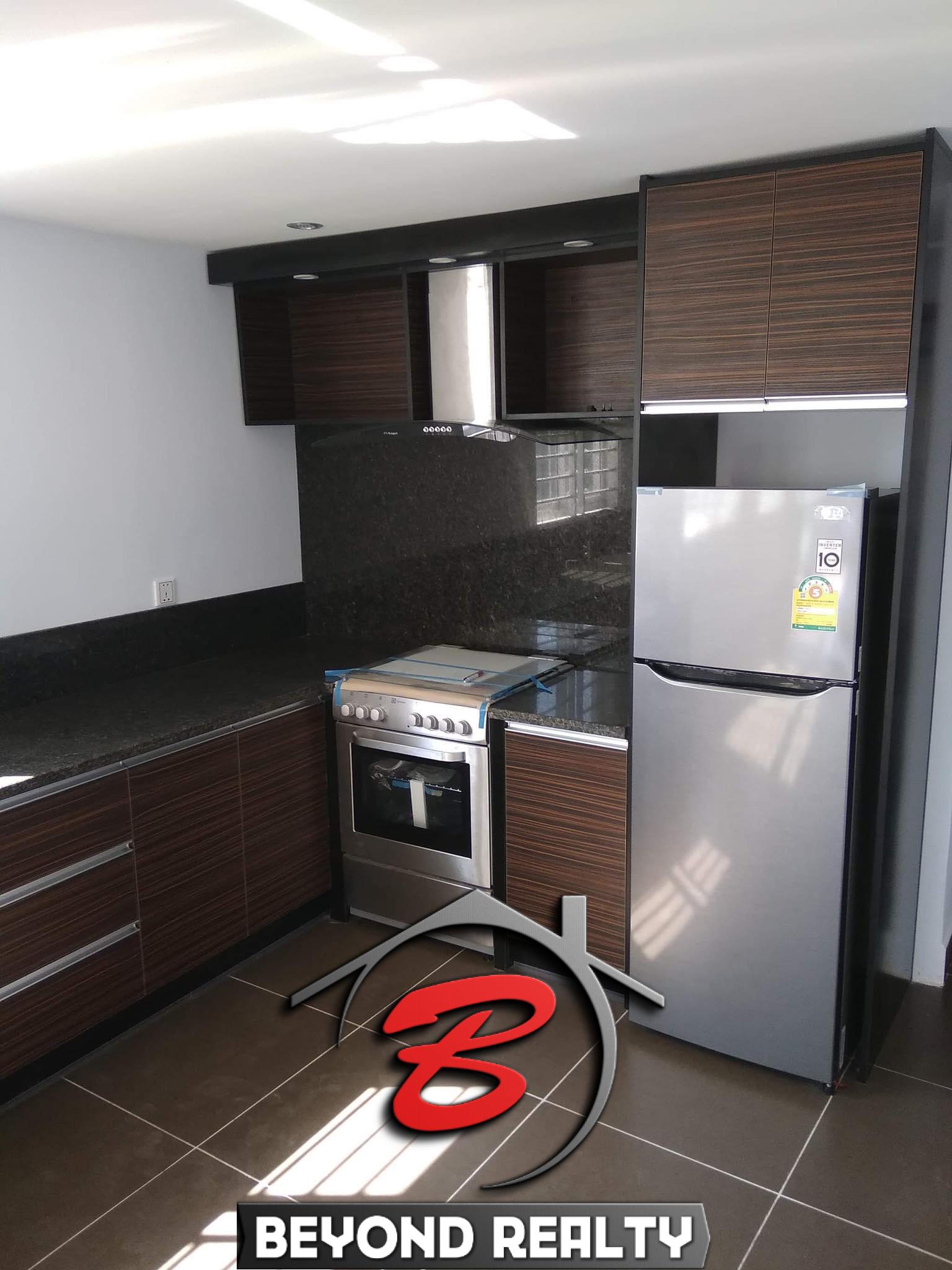 the kitchen of the 2br renovated apartment for sale riverside Phnom Penh