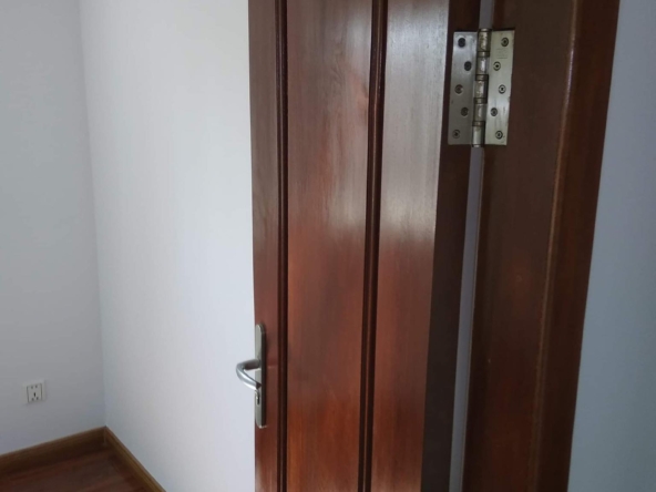 a bedroom of the 2br renovated apartment for sale riverside Phnom Penh