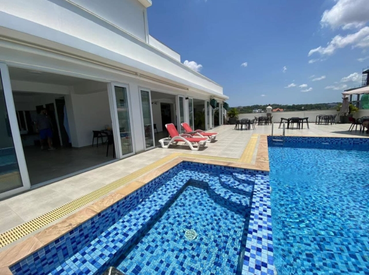 the swimming pool of the living room of the 2br luxury condo unit resale CVIK 2 in Sangkat 4 Sihanoukville Cambodia