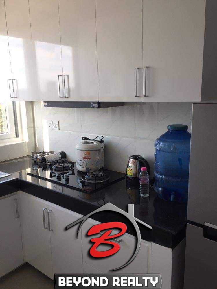 the kitchen of the modern studio condo resale at CVIK Apartments 3 in Sangkat 4 Sihanoukville Cambodia